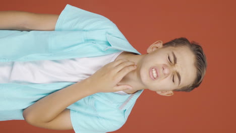 Vertical-video-of-Boy-with-sore-throat.